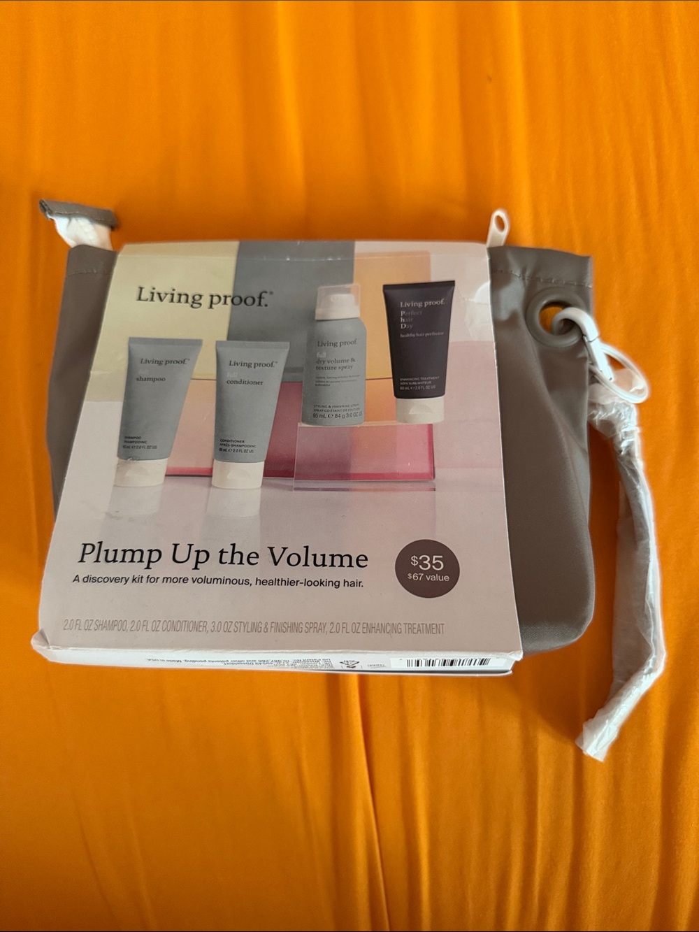 Living Proof Plump Up the Volume Kit — Taupe Travel Pouch with White Accents